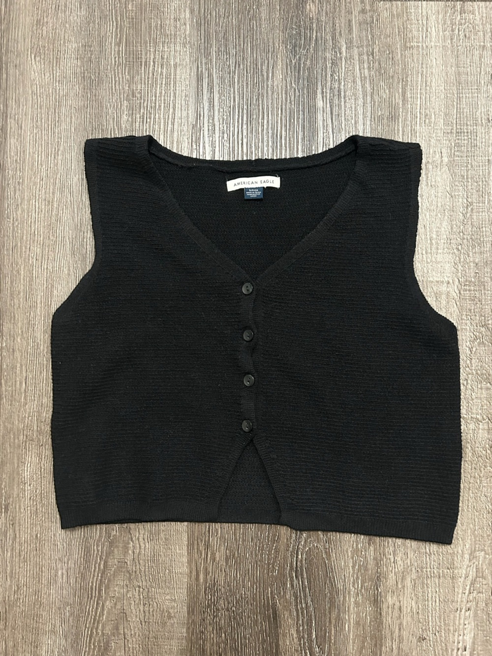 90s all black minimalist sweater vest